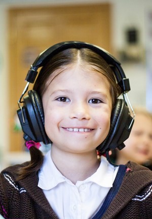 student with headphones